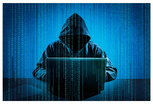 Hooded Hacker on Laptop