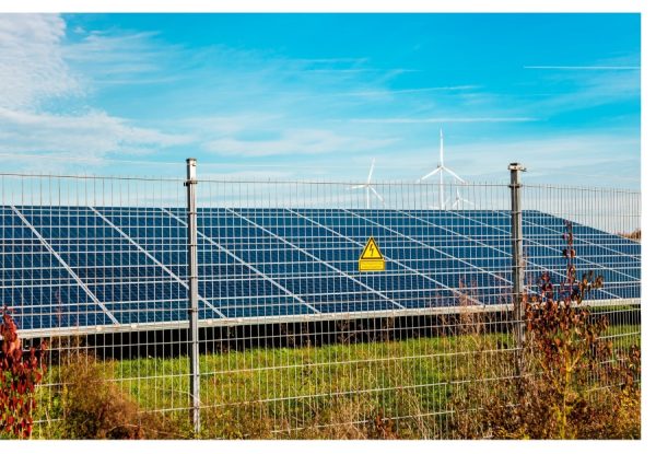 Electric fence guarding solar panels