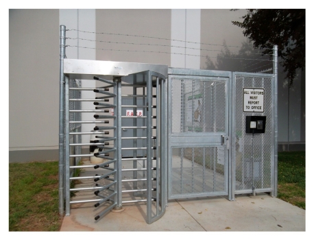 Exterior Full Height Turnstiles with Barbed Wire