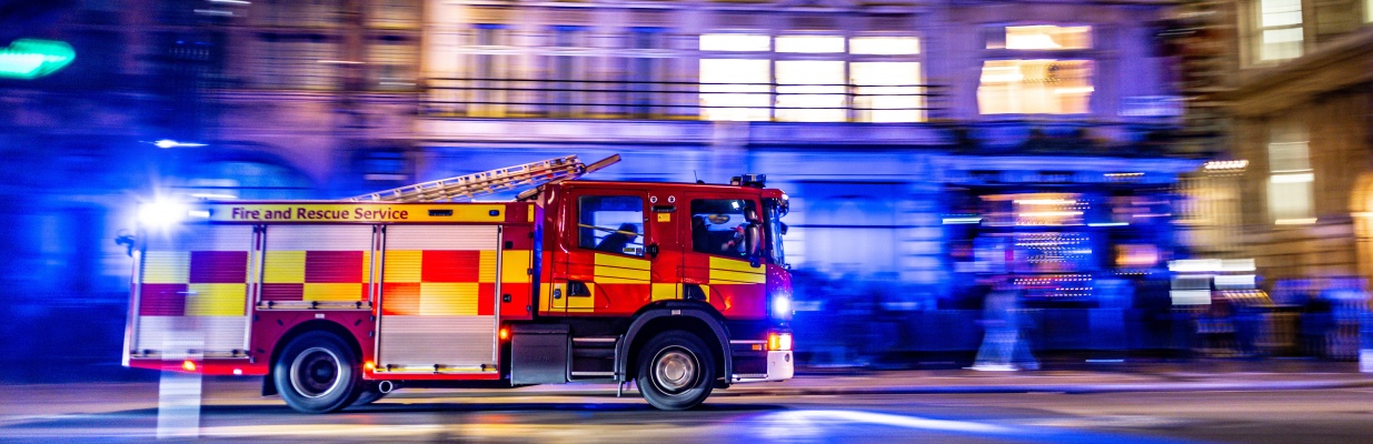 Firetruck on an emergency call in a city