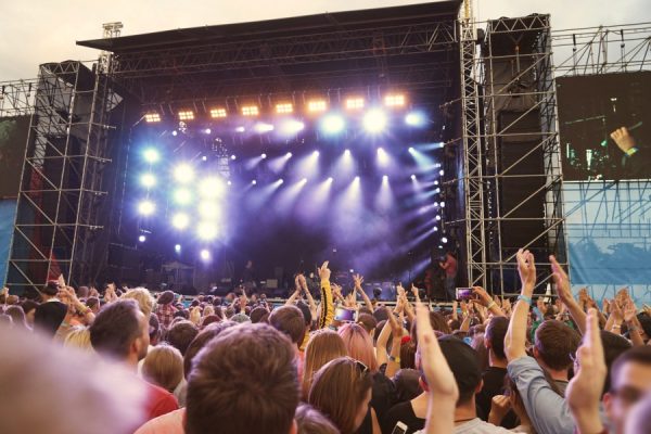 Outdoor concert with fans