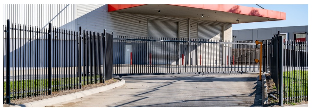 Perimeter entrance of building with gate
