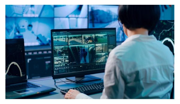 Person watching surveillance video on a monitor
