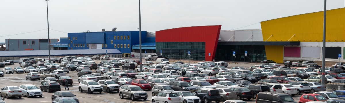 Shopping Area with Crowded Parking Lot Shopping Area with Crowded Parking Lot