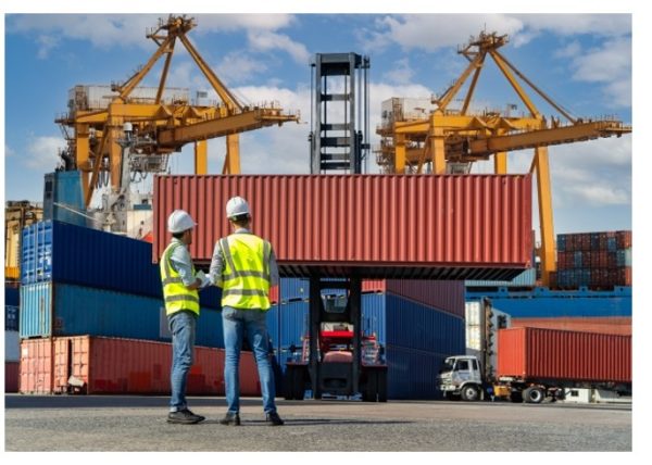 Two men working at a cargo port